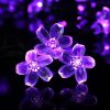 Şir de lumini solare, 50 LED, design cu flori de cireş, violet Sakura, 5m, exter
